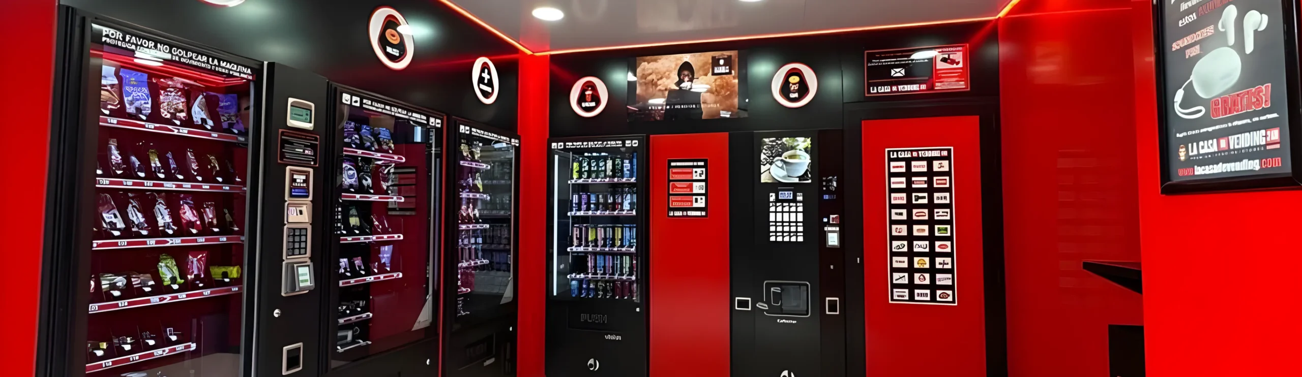 Máquinas expendedoras en tienda roja y negra moderna.